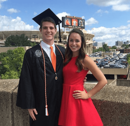 Emily Proud During Graduation Ceremony of Husband